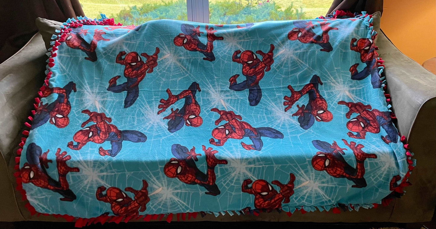 Cuddle up and stay warm with one of my medium size fleece tie knot blankets