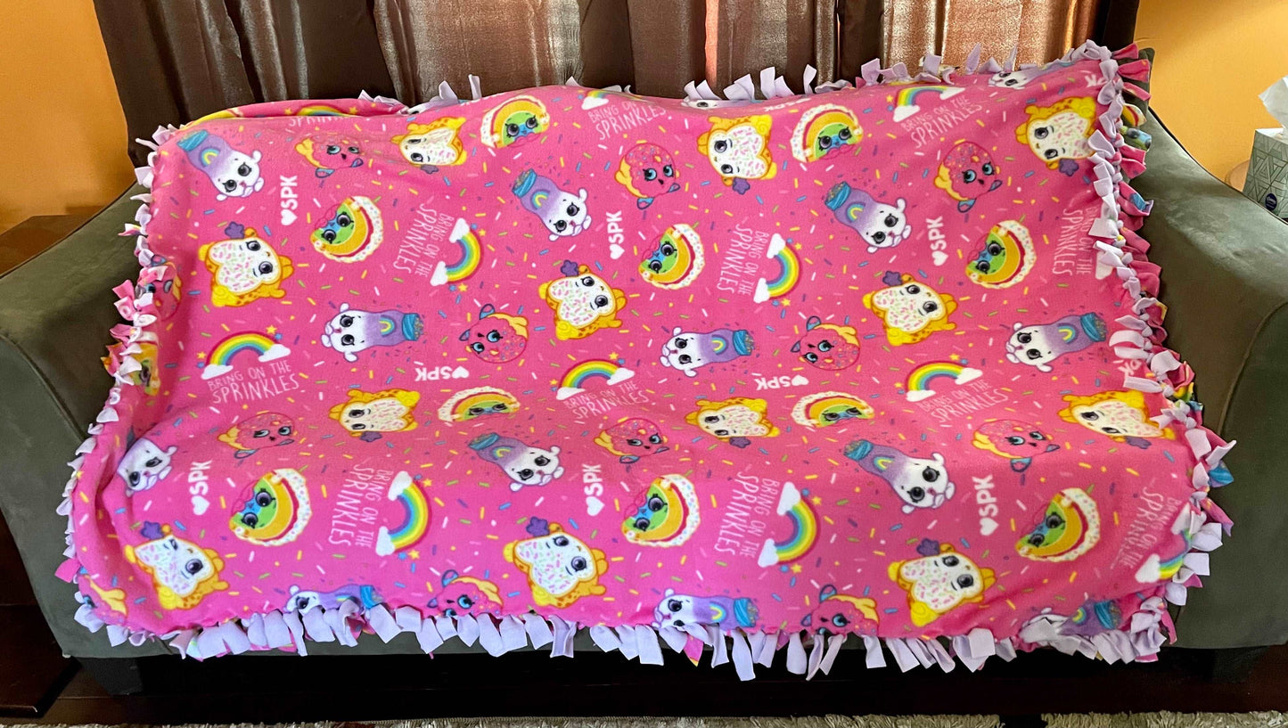 Cuddle up and stay warm with one of my medium size fleece tie knot blankets
