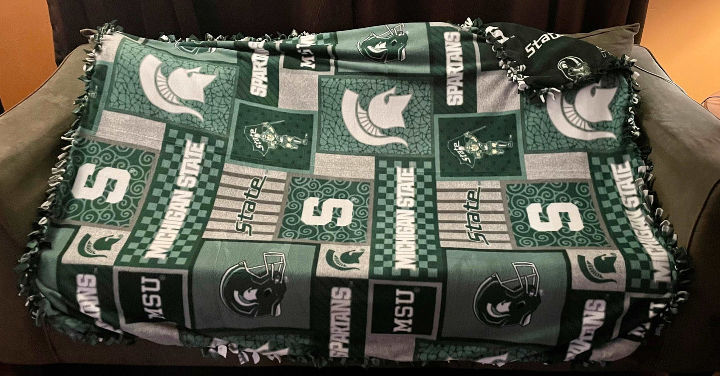 Cuddle up and stay warm with one of my medium size fleece tie knot blankets
