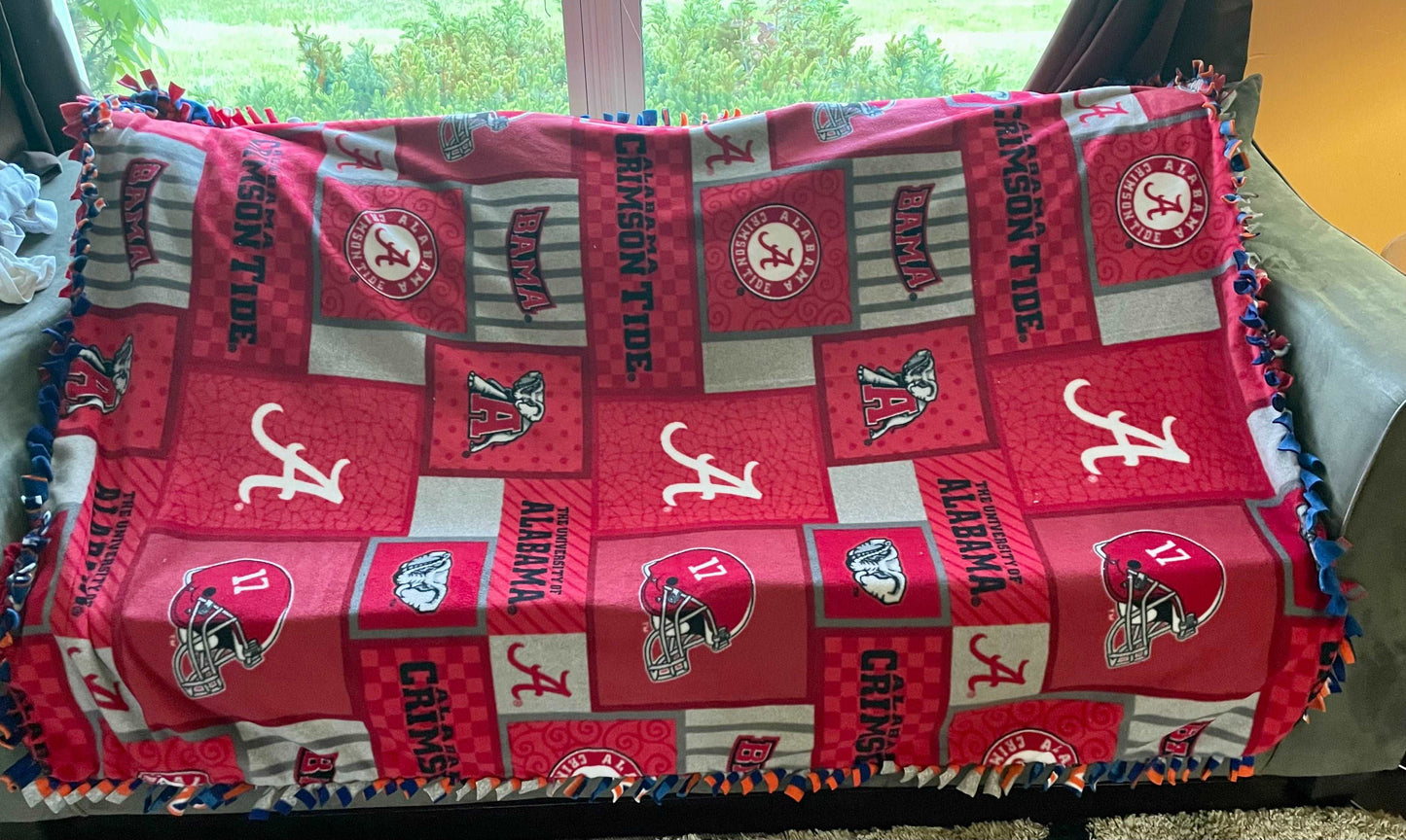 Cuddle up and stay warm with one of my medium size fleece tie knot blankets