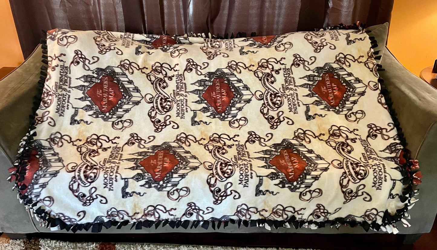 Cuddle up and stay warm with one of my medium size fleece tie knot blankets