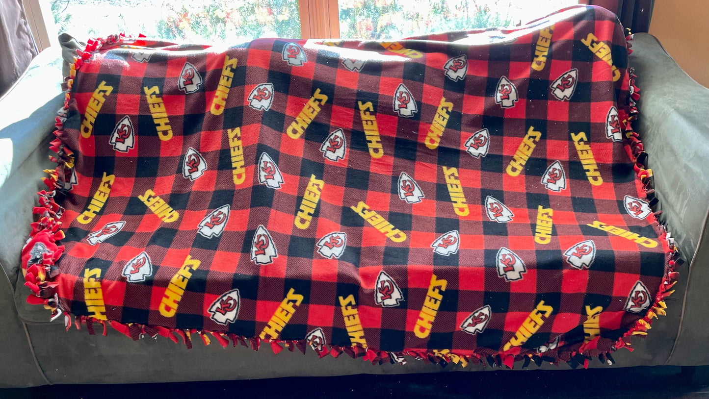 Cuddle up and stay warm with one of my medium size fleece tie knot blankets