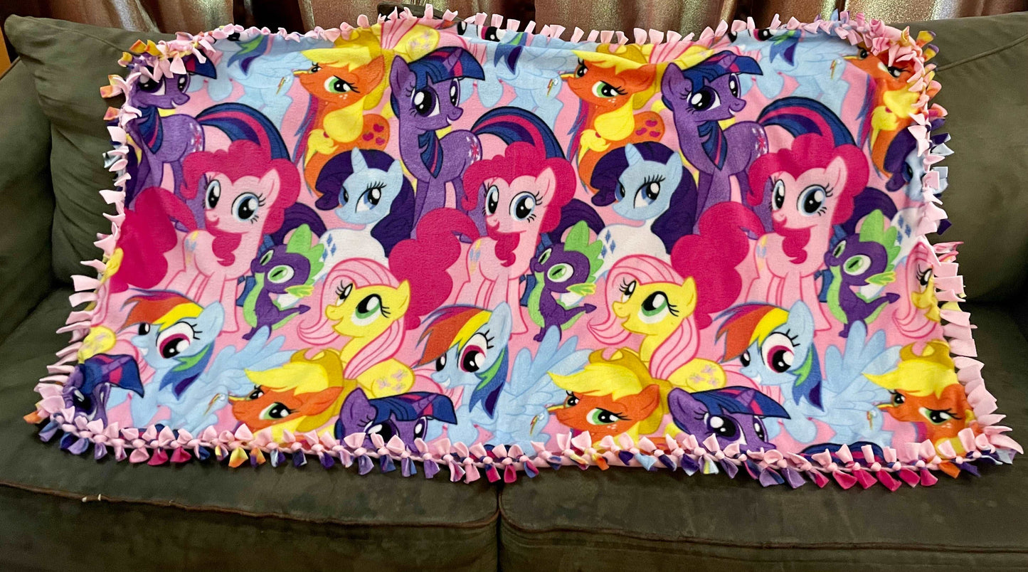 Cuddle up and stay warm with one of my medium size fleece tie knot blankets