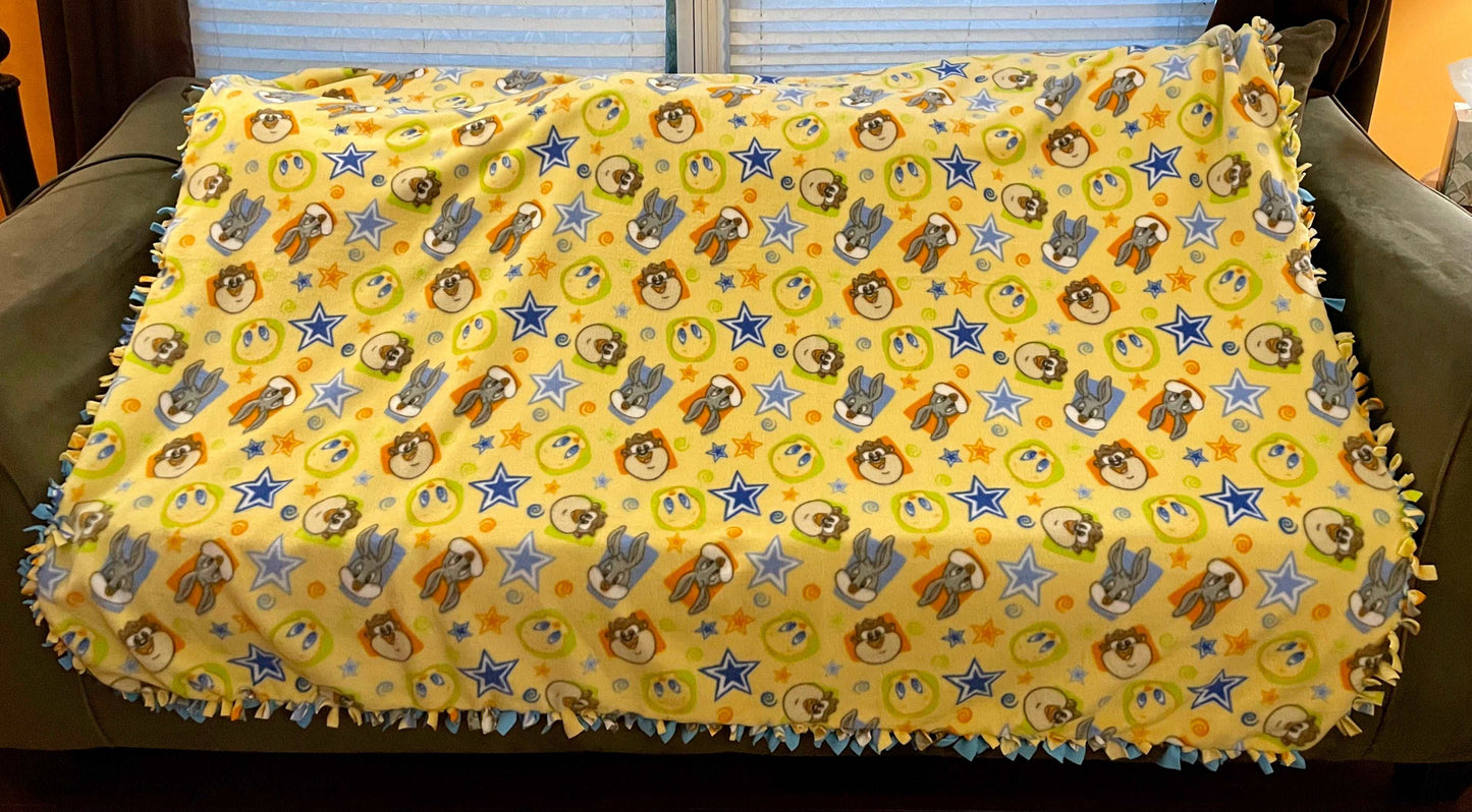 Cuddle up and stay warm with one of my medium size fleece tie knot blankets