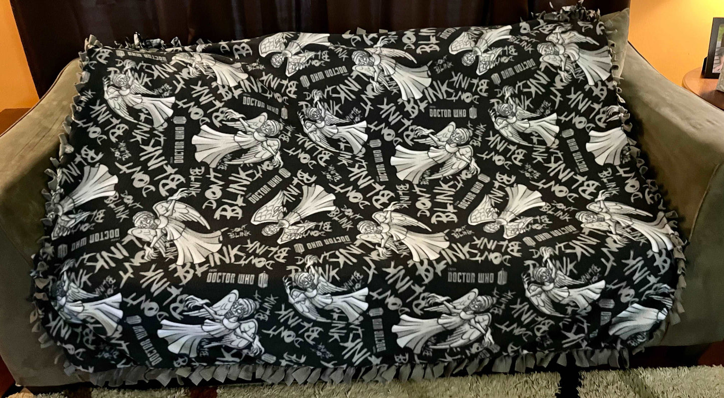 Cuddle up and stay warm with one of my medium size fleece tie knot blankets