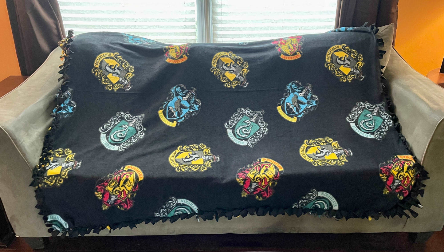 Cuddle up and stay warm with one of my medium size fleece tie knot blankets