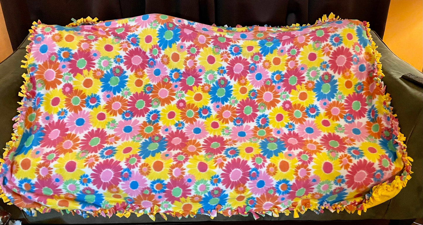 Cuddle up and stay warm with one of my medium size fleece tie knot blankets