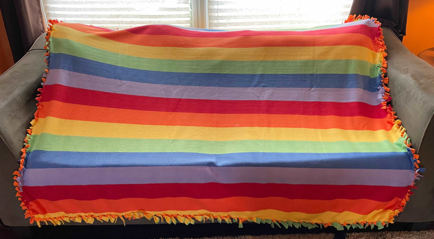 Cuddle up and stay warm with one of my medium size fleece tie knot blankets