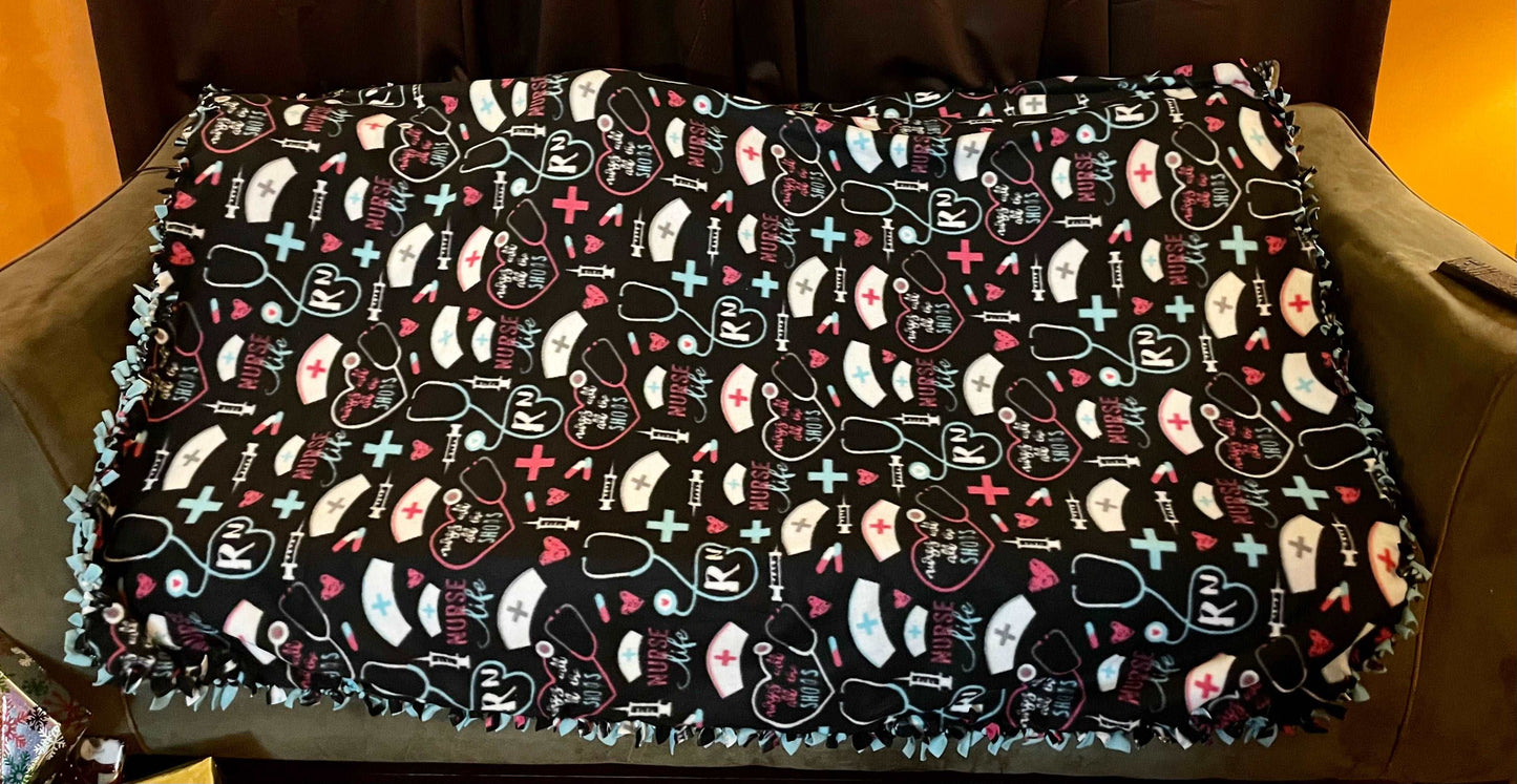 Cuddle up and stay warm with one of my medium size fleece tie knot blankets