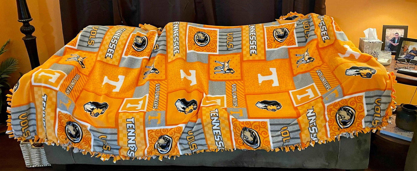 Cuddle up and stay warm with one of my medium size fleece tie knot blankets