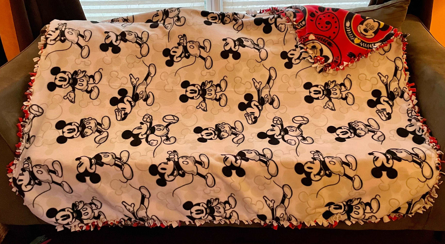 Cuddle up and stay warm with one of my medium size fleece tie knot blankets