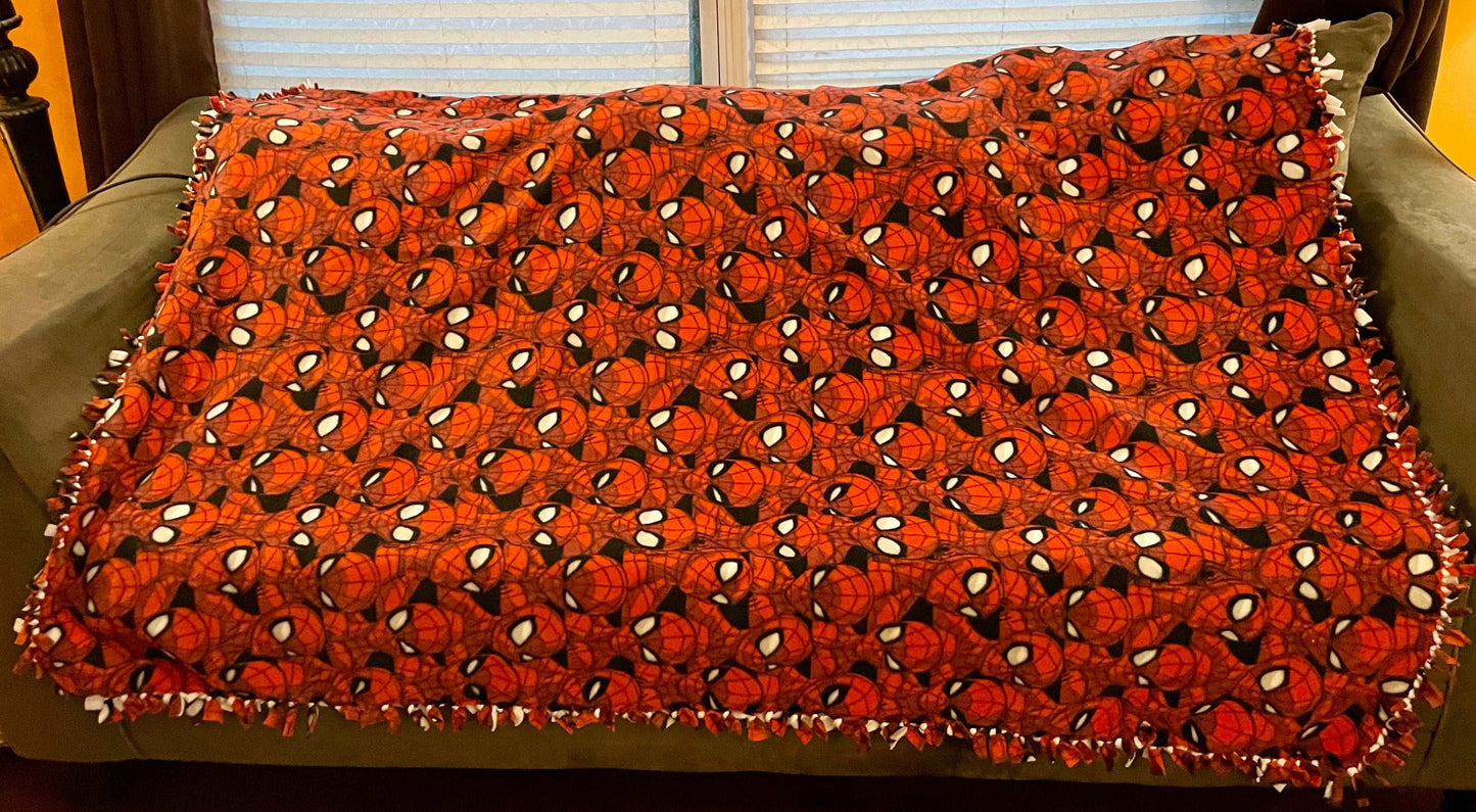 Cuddle up and stay warm with one of my medium size fleece tie knot blankets