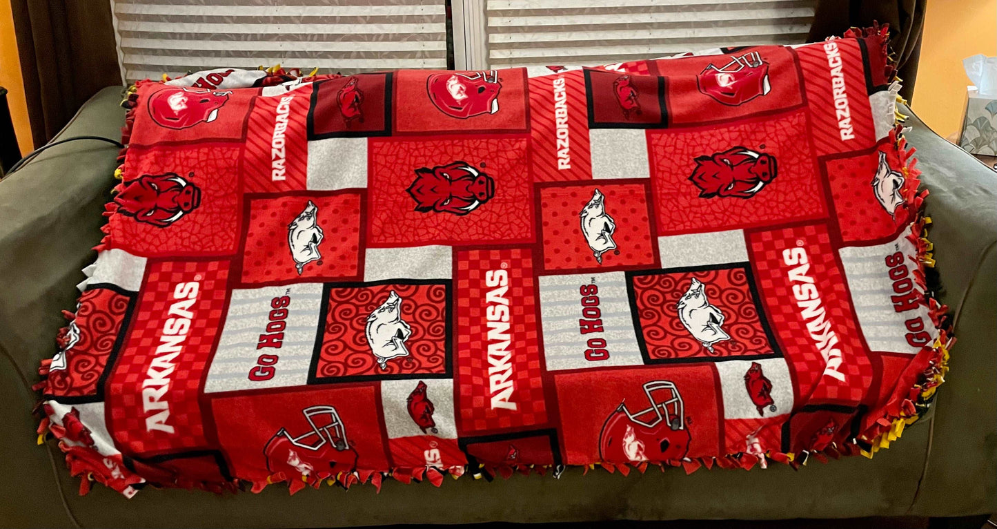 Cuddle up and stay warm with one of my medium size fleece tie knot blankets
