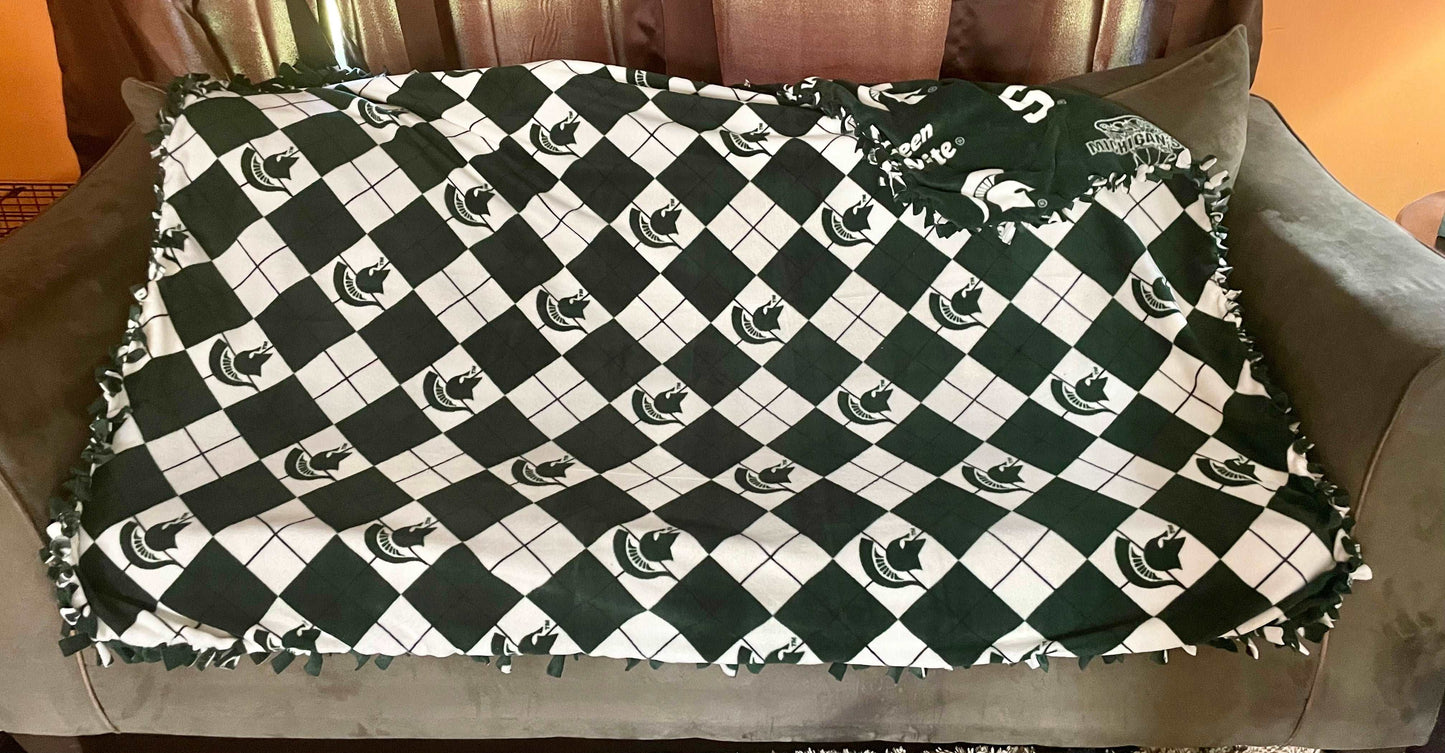 Cuddle up and stay warm with one of my medium size fleece tie knot blankets
