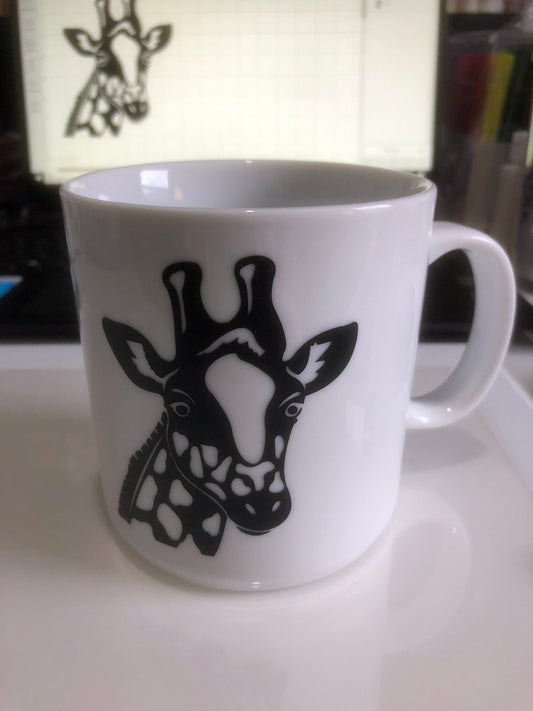 Love giraffes? Enjoy your coffee in this 14 ounce ceramic coffee cup!