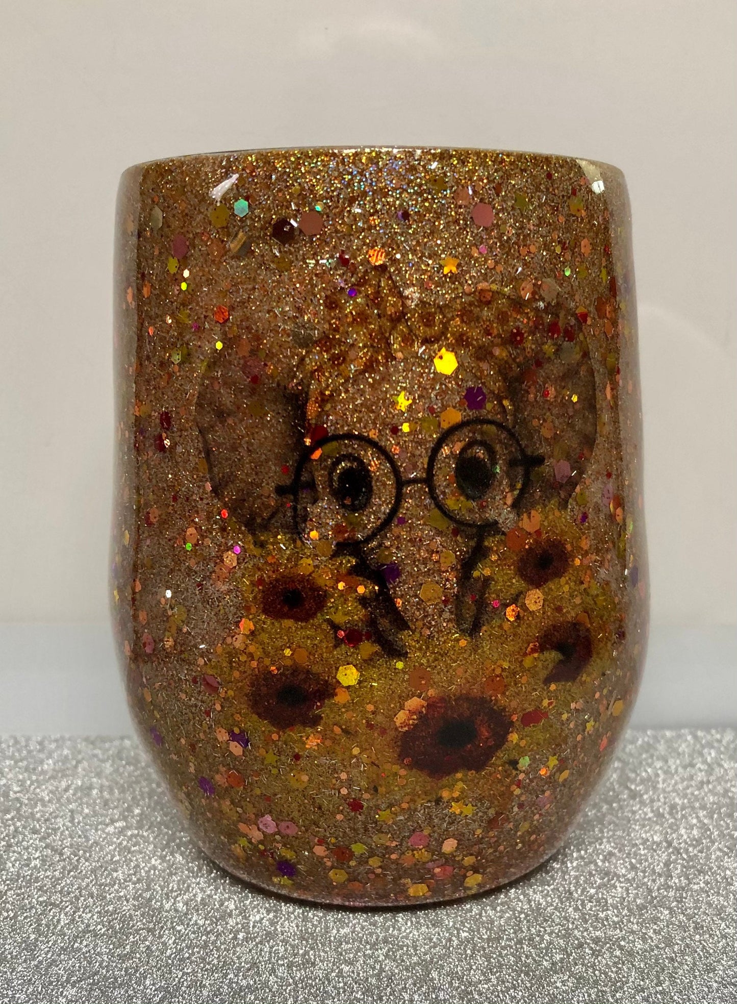 Elephants and Sunflowers? Enjoy a beverage in this 12oz Tumbler.