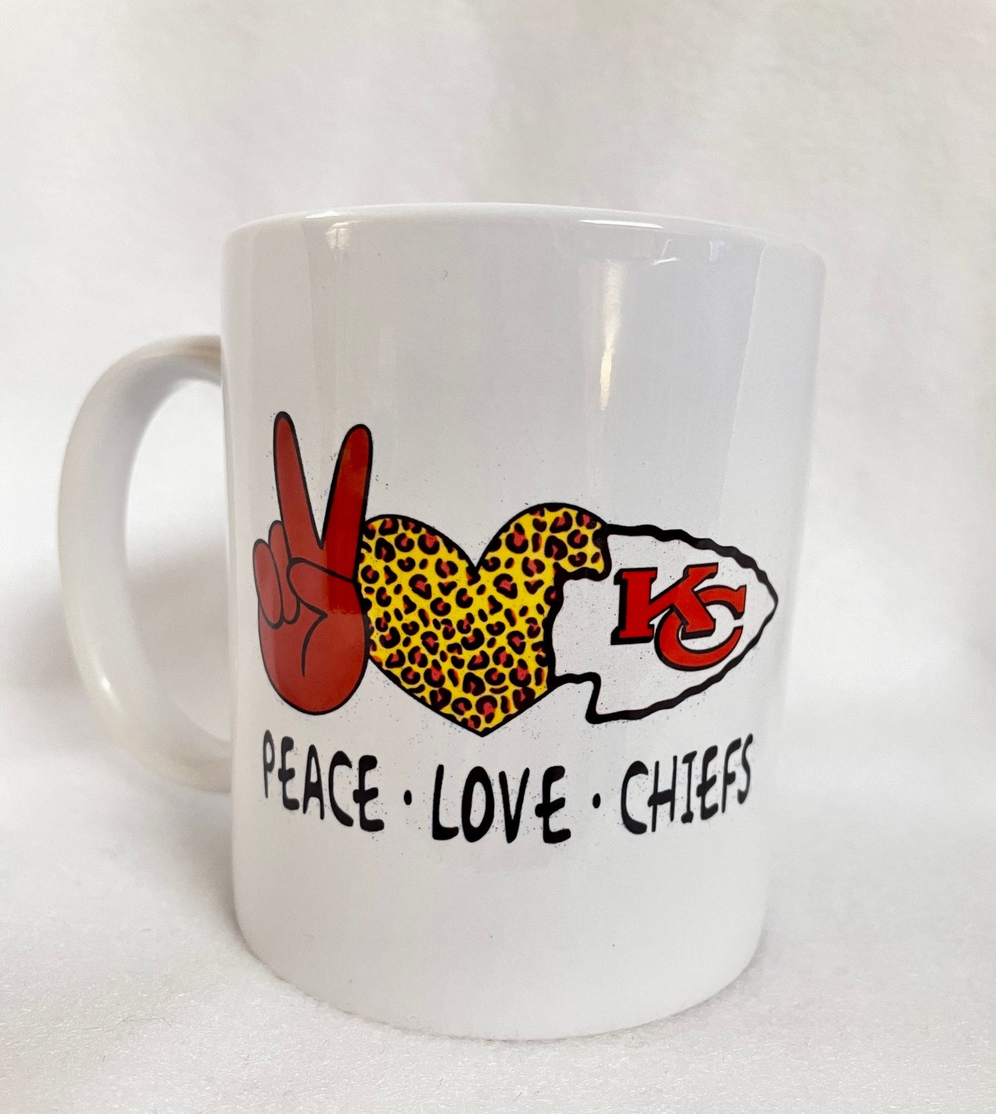 Love the Kansas City Chiefs? Enjoy your coffee in this 14 ounce ceramic coffee cup!