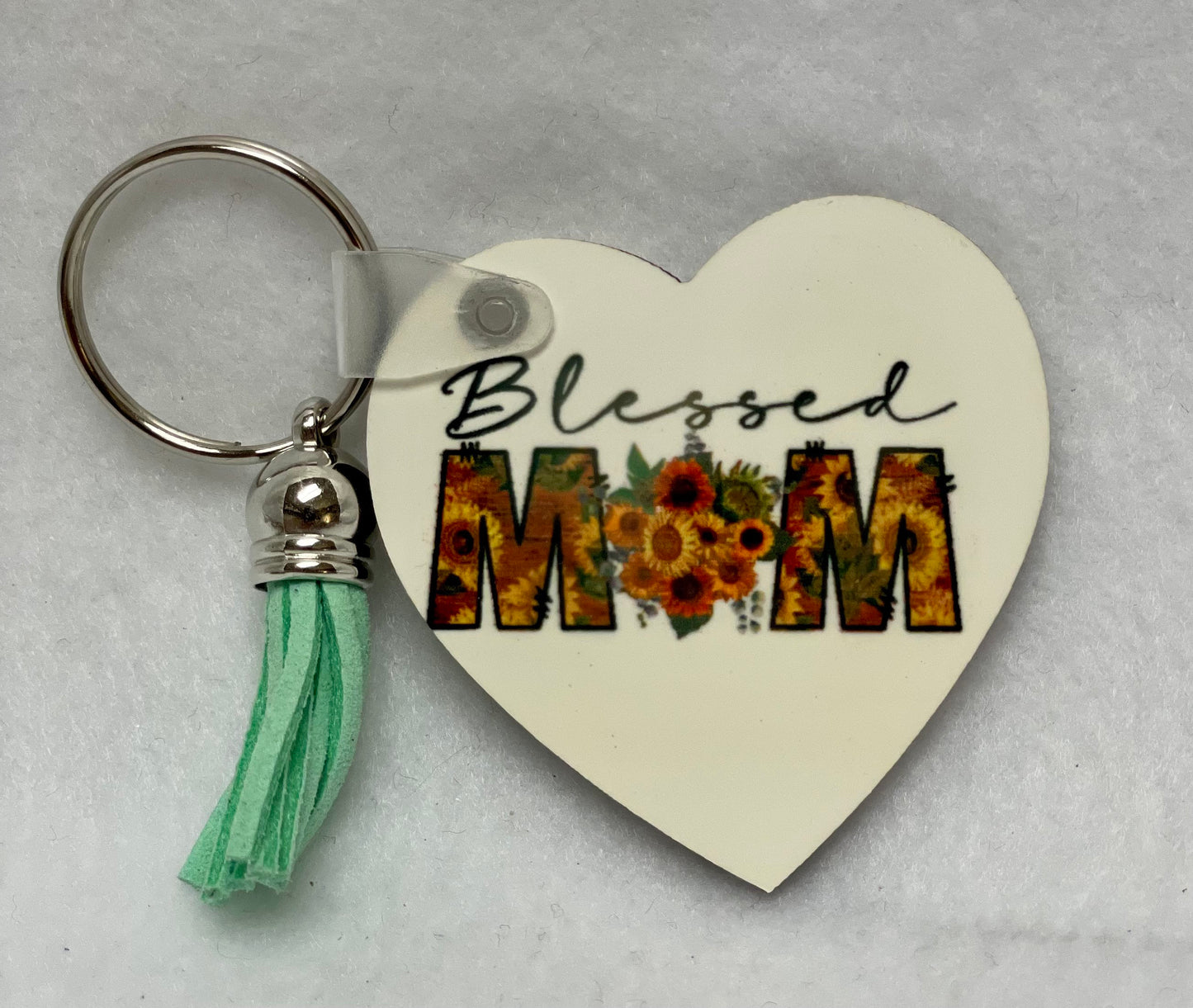 These are key rings with a leather tassel. Please specify in comments which one you are interested in. Each sold separately