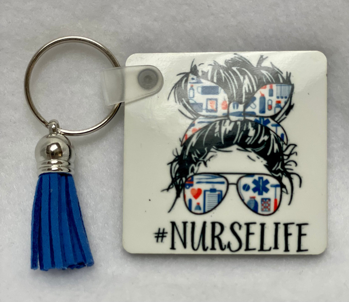 These are key rings with a leather tassel. Please specify in comments which one you are interested in. Each sold separately