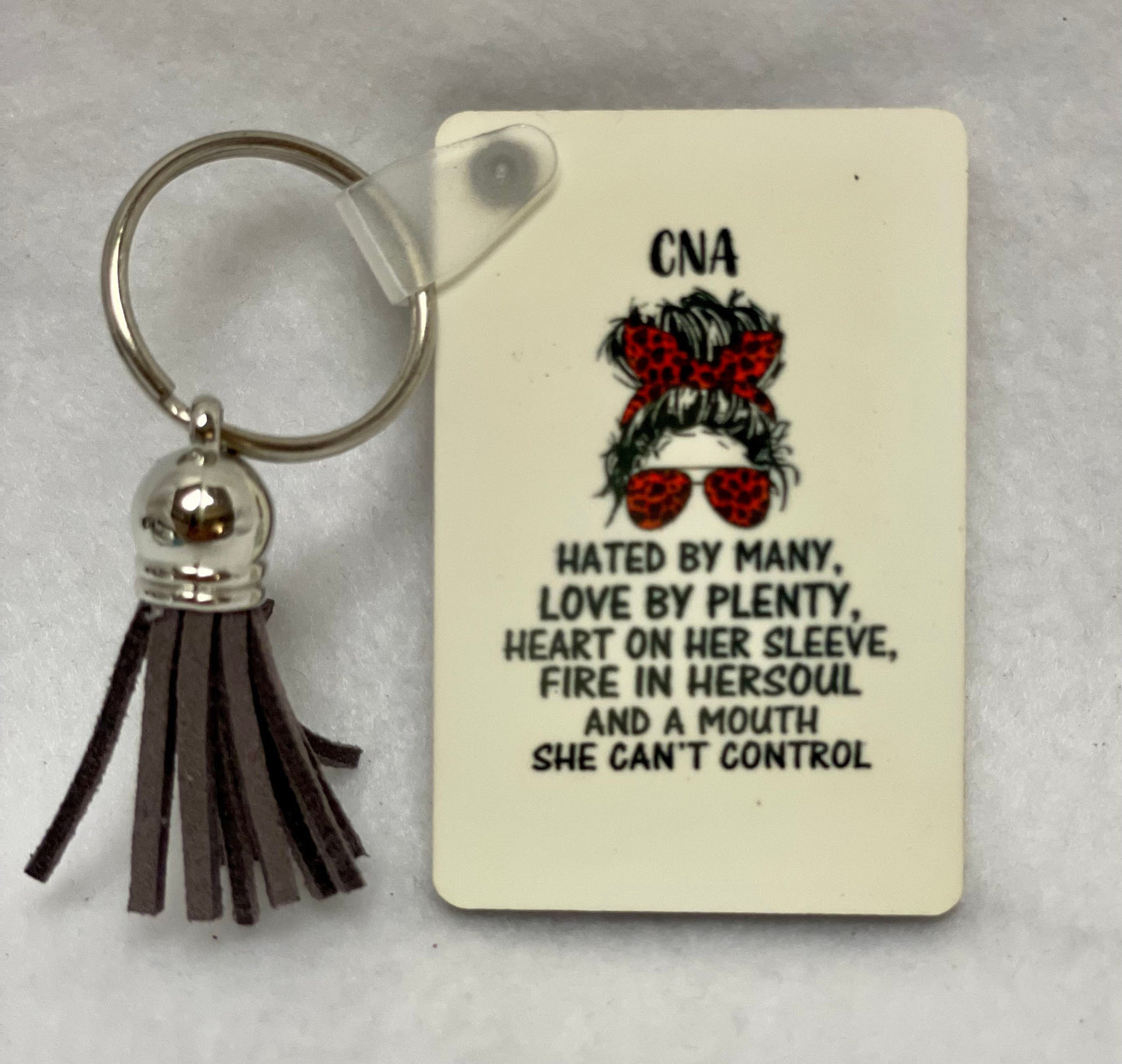 These are key rings with a leather tassel. Please specify in comments which one you are interested in. Each sold separately