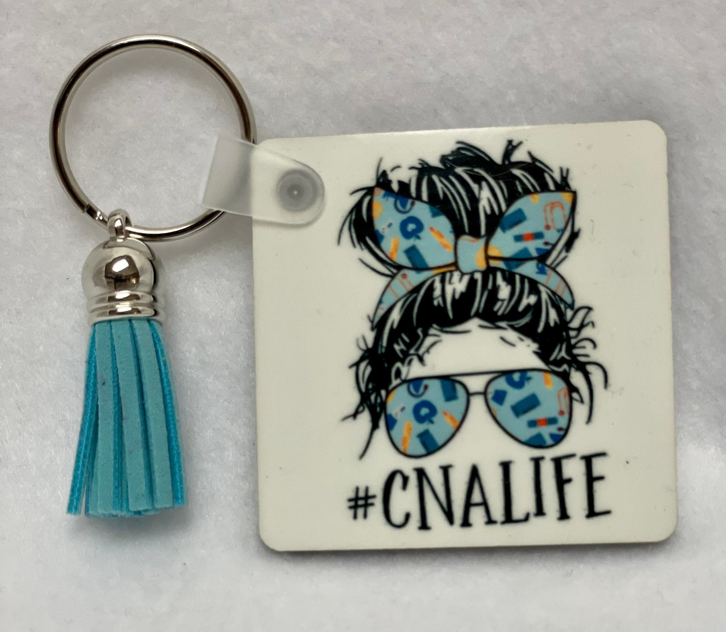 These are key rings with a leather tassel. Please specify in comments which one you are interested in. Each sold separately