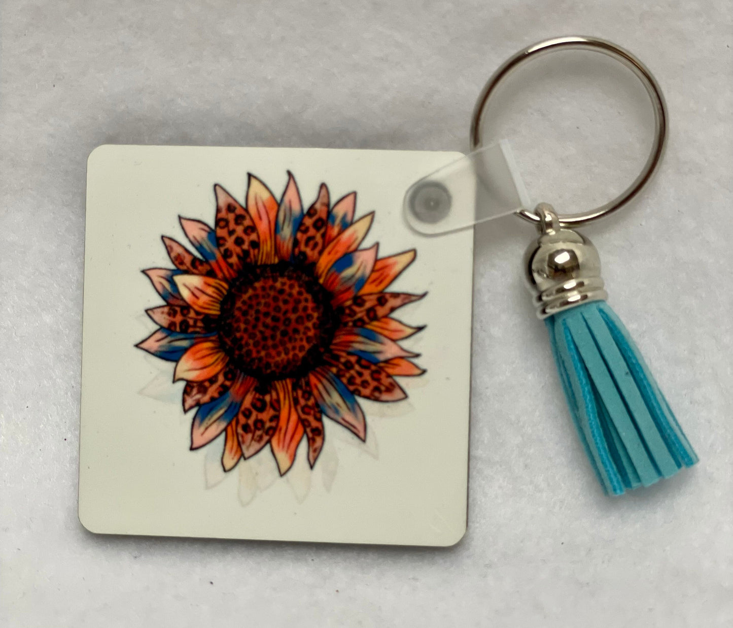 These are key rings with a leather tassel. Please specify in comments which one you are interested in. Each sold separately