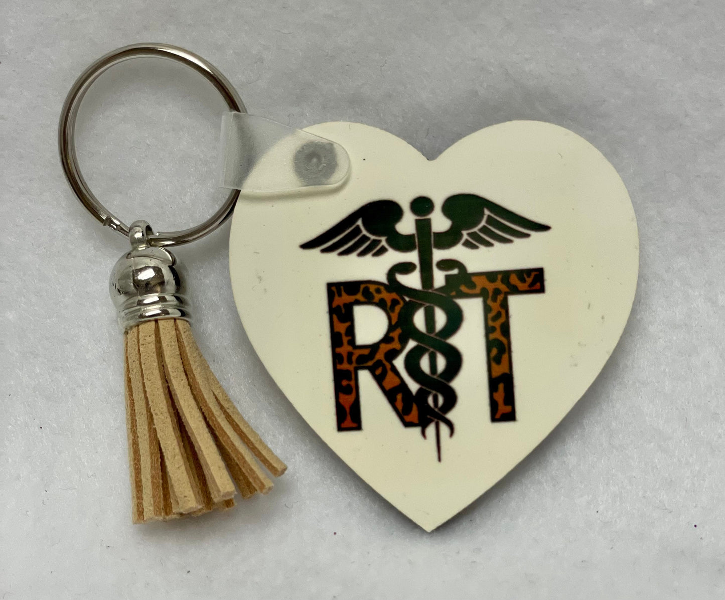 These are key rings with a leather tassel. Please specify in comments which one you are interested in. Each sold separately