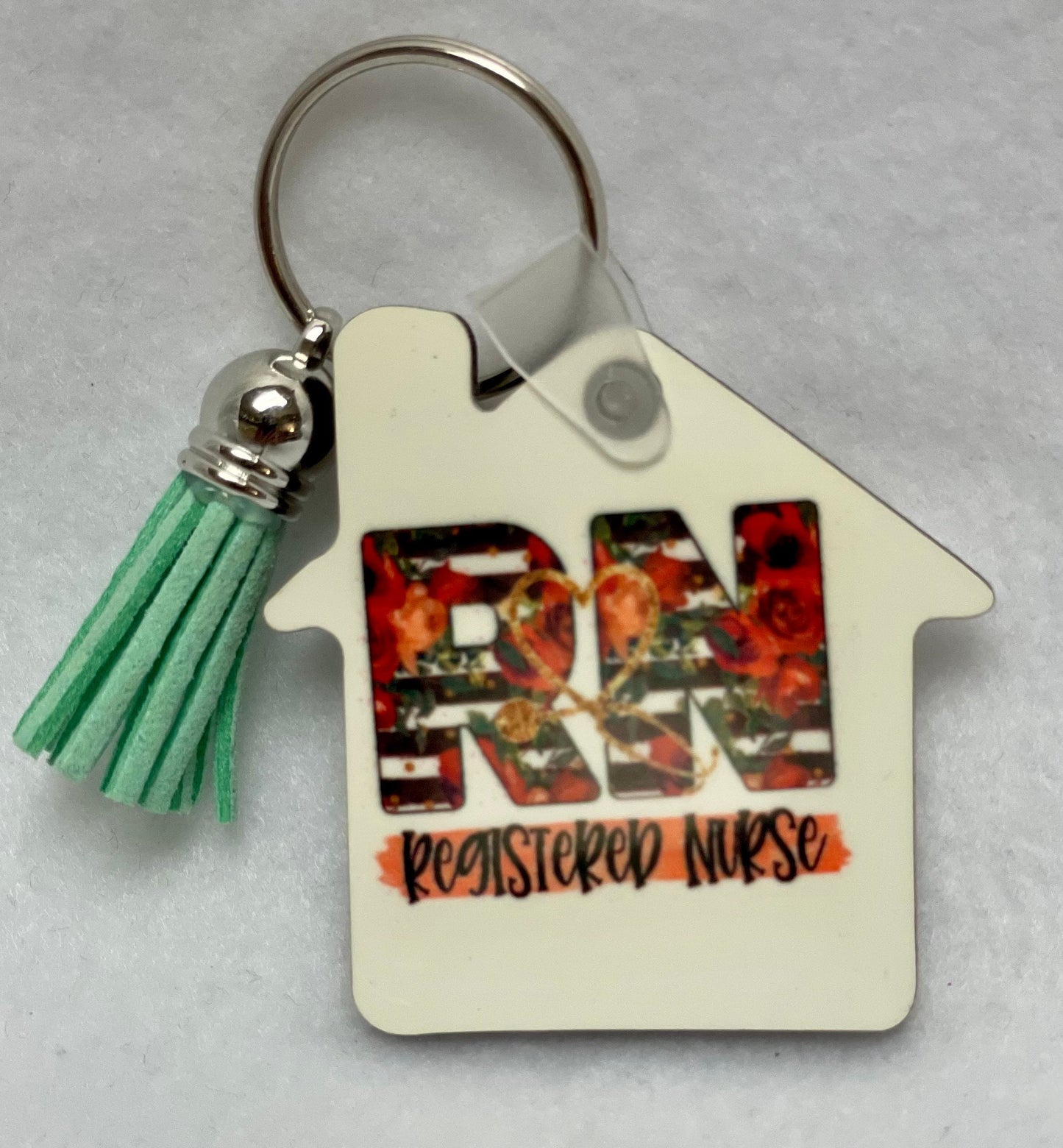 These are key rings with a leather tassel. Please specify in comments which one you are interested in. Each sold separately