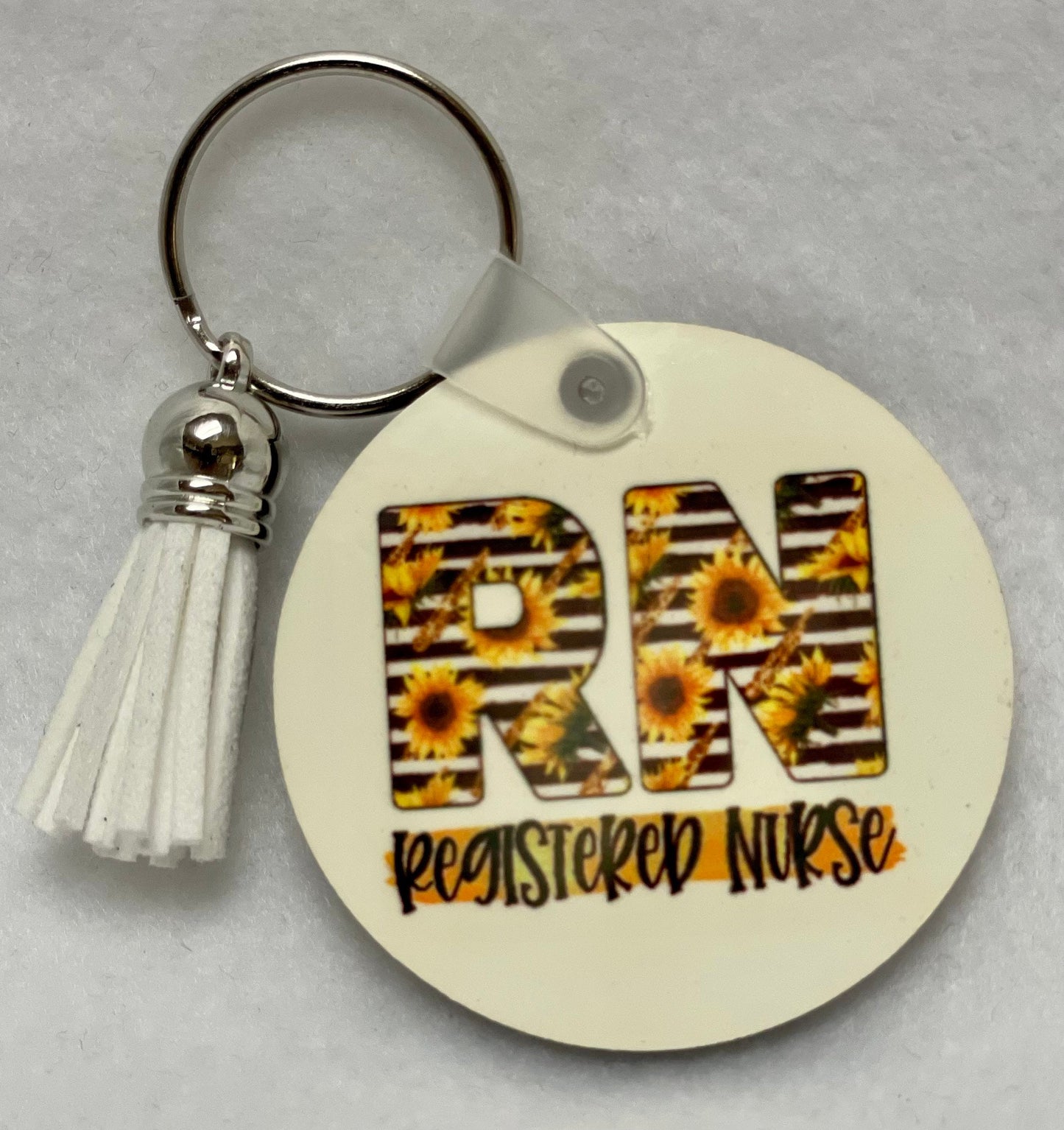 These are key rings with a leather tassel. Please specify in comments which one you are interested in. Each sold separately