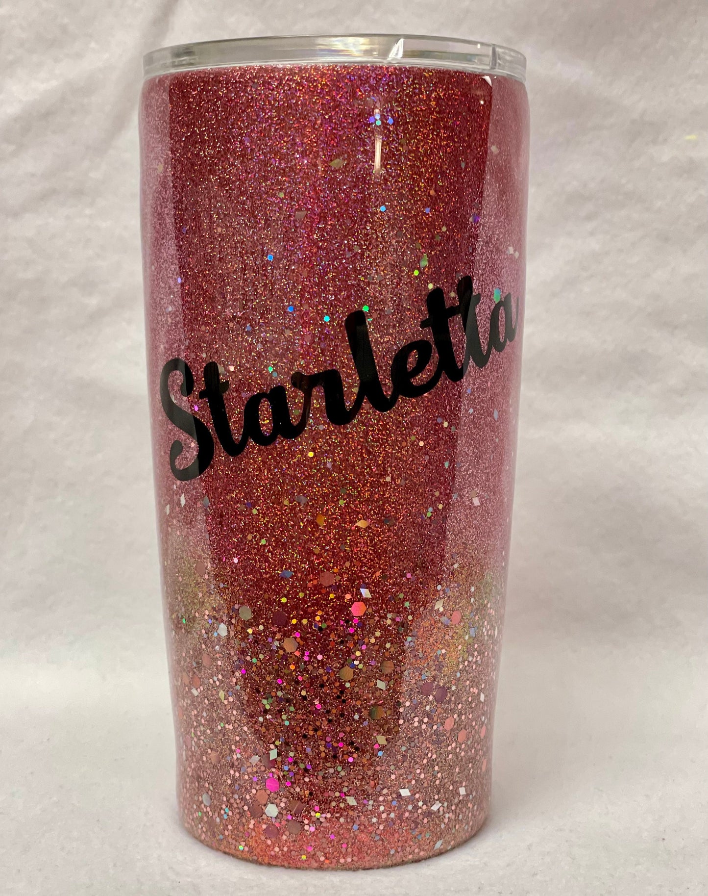 Do you want to personalize your tumbler? Enjoy a beverage in this 20oz Hydro- dipped Tumbler.