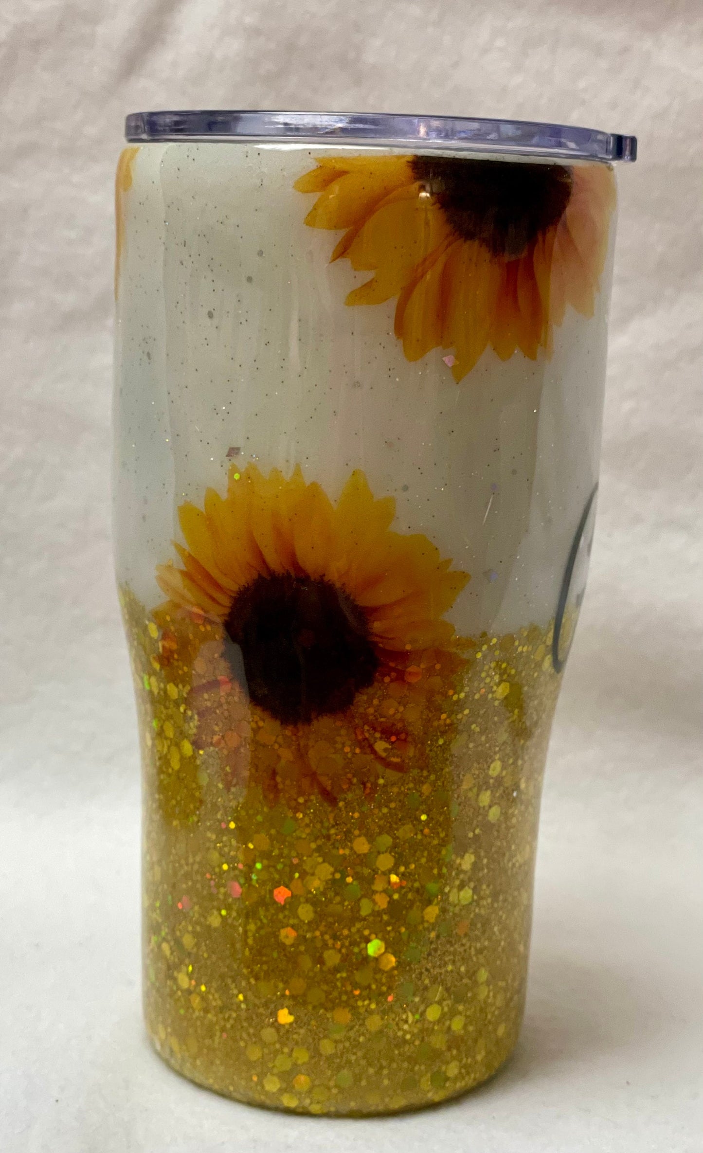 Love Sunflowers? Enjoy a beverage in this 20oz Tumbler.