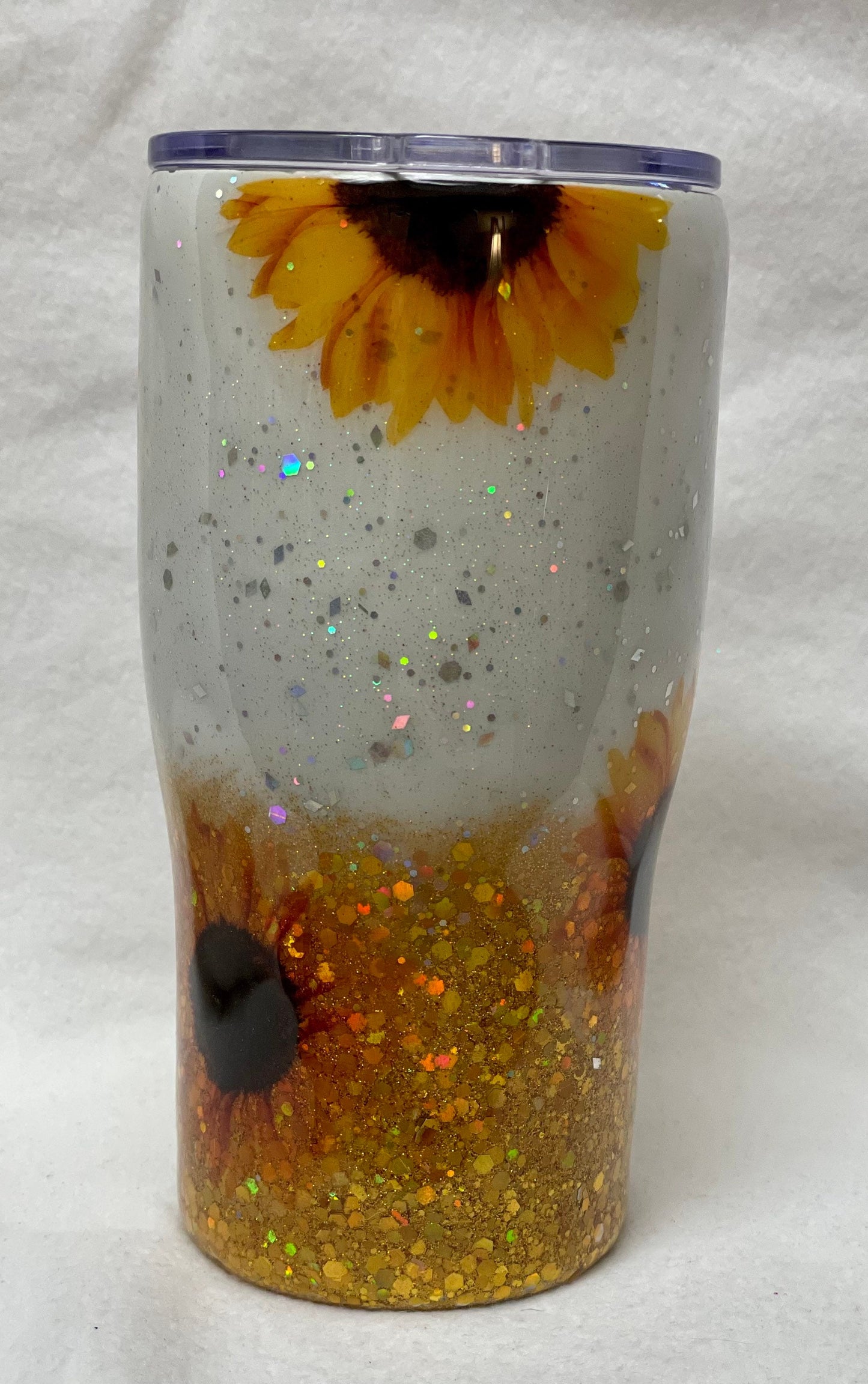 Love Sunflowers? Enjoy a beverage in this 20oz Tumbler.
