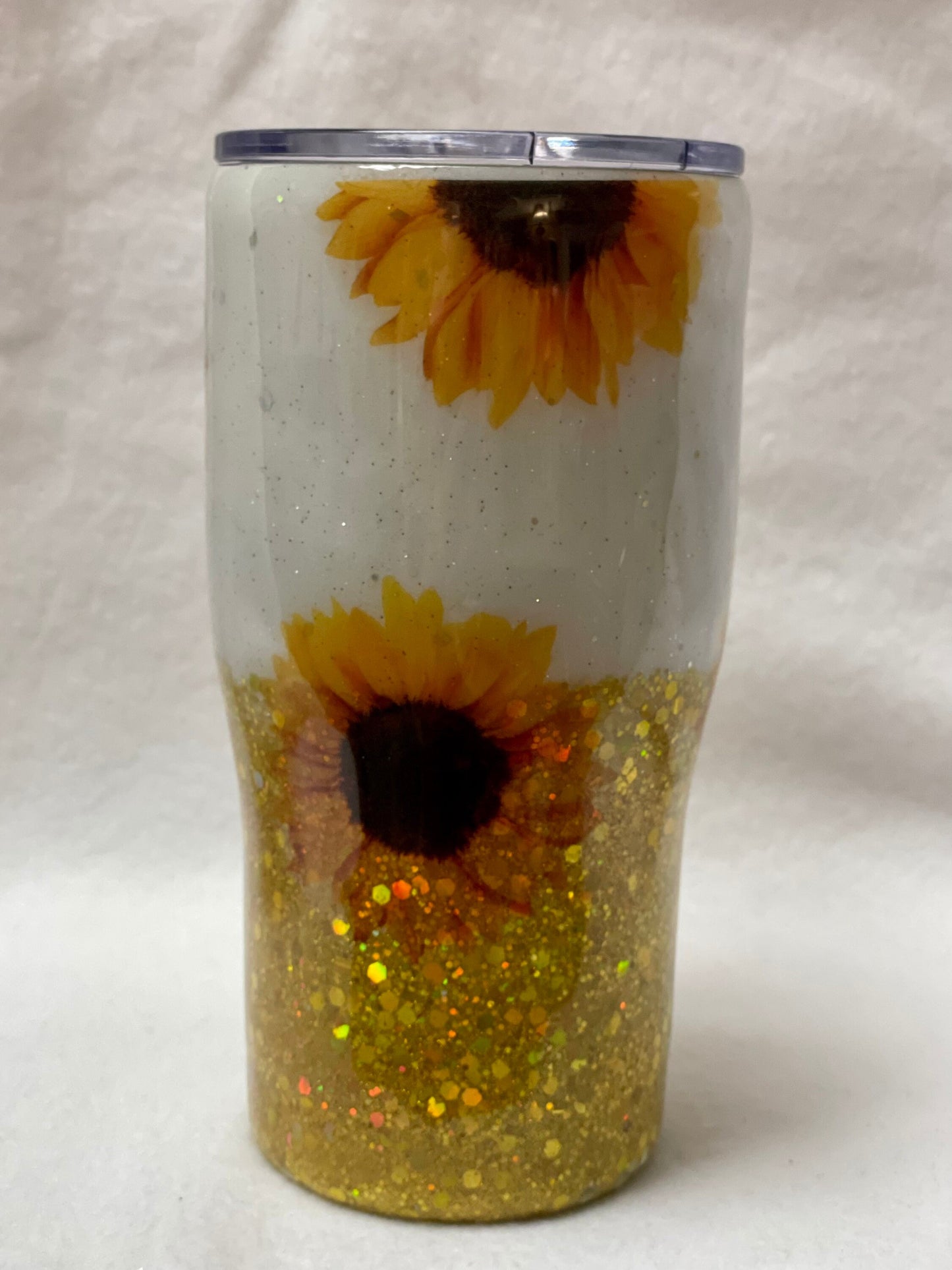 Love Sunflowers? Enjoy a beverage in this 20oz Tumbler.