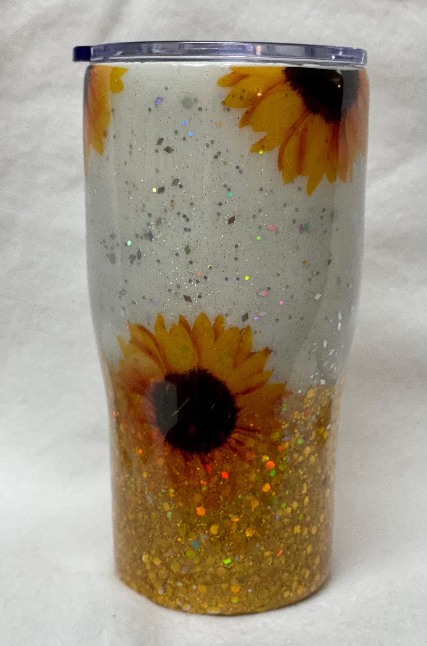 Love Sunflowers? Enjoy a beverage in this 20oz Tumbler.