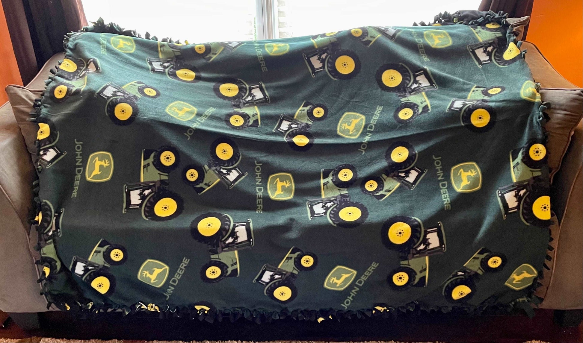 Cuddle up and stay warm with one of my medium size fleece tie knot blankets