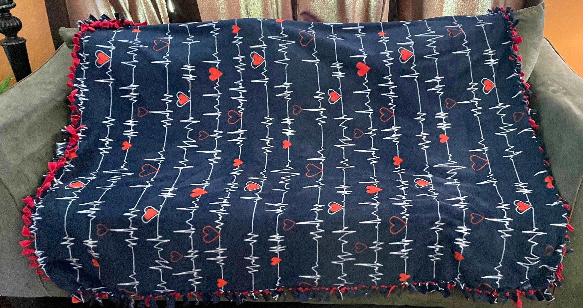Cuddle up and stay warm with one of my medium size fleece tie knot blankets