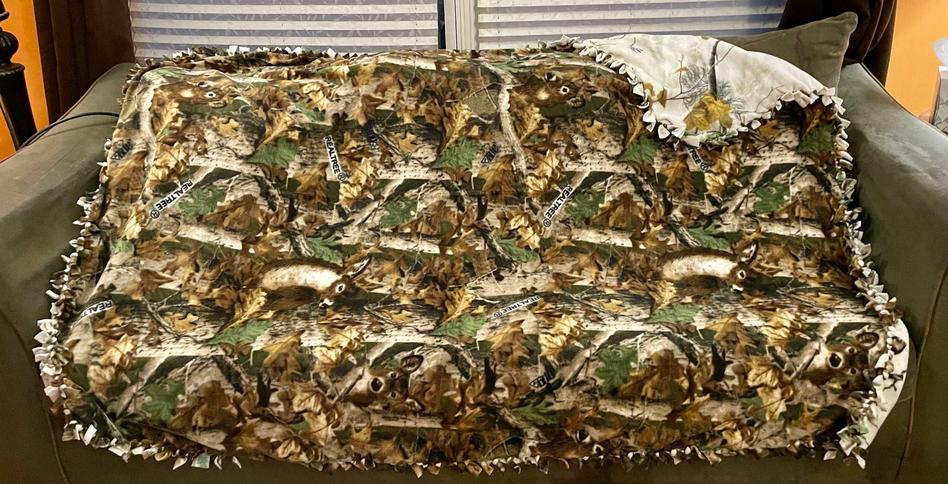 Cuddle up and stay warm with one of my medium size fleece tie knot blankets