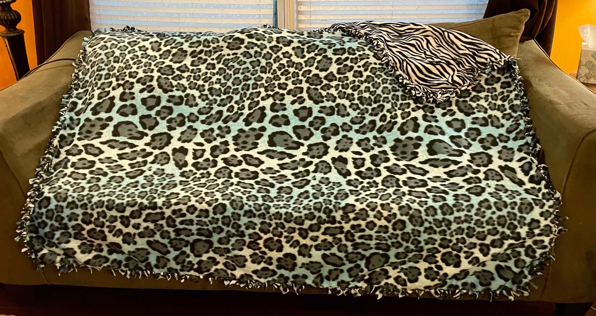 Cuddle up and stay warm with one of my medium size fleece tie knot blankets