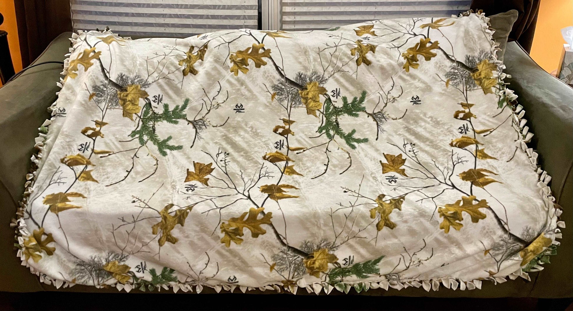 Cuddle up and stay warm with one of my medium size fleece tie knot blankets