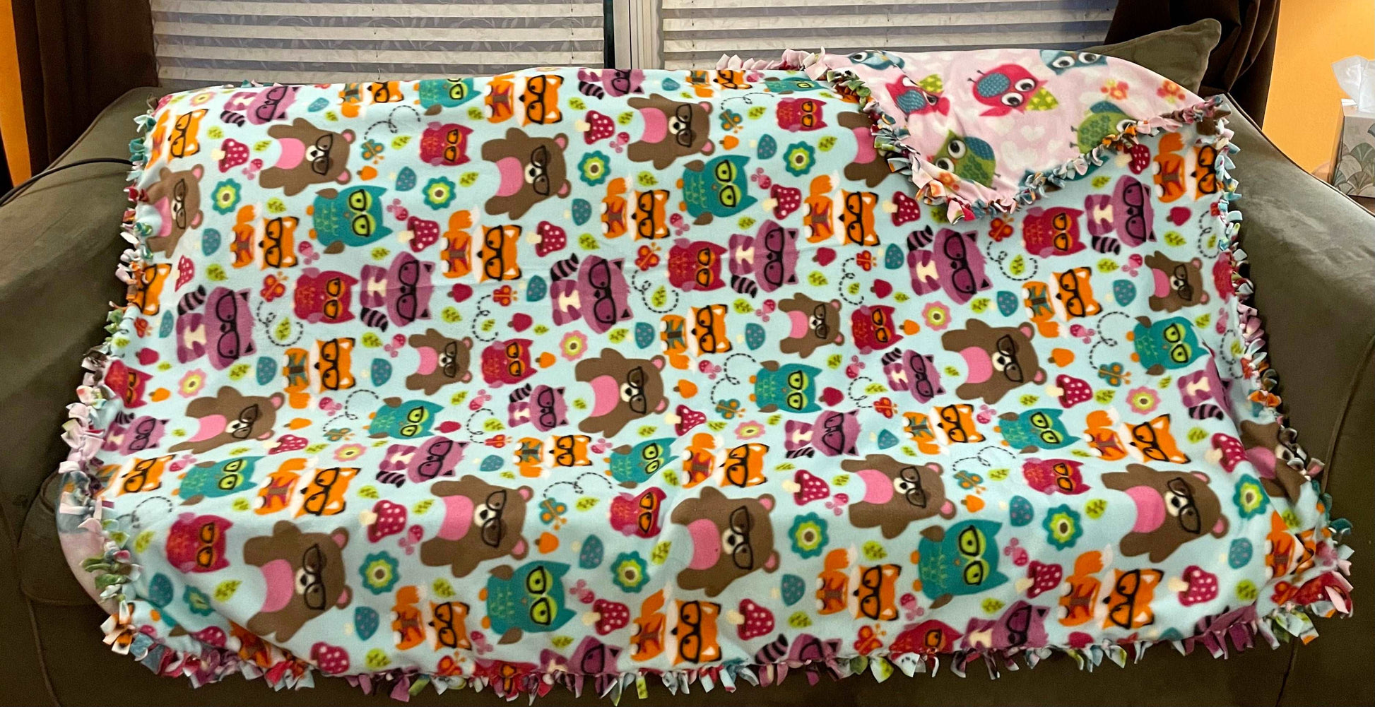 Cuddle up and stay warm with one of my medium size fleece tie knot blankets