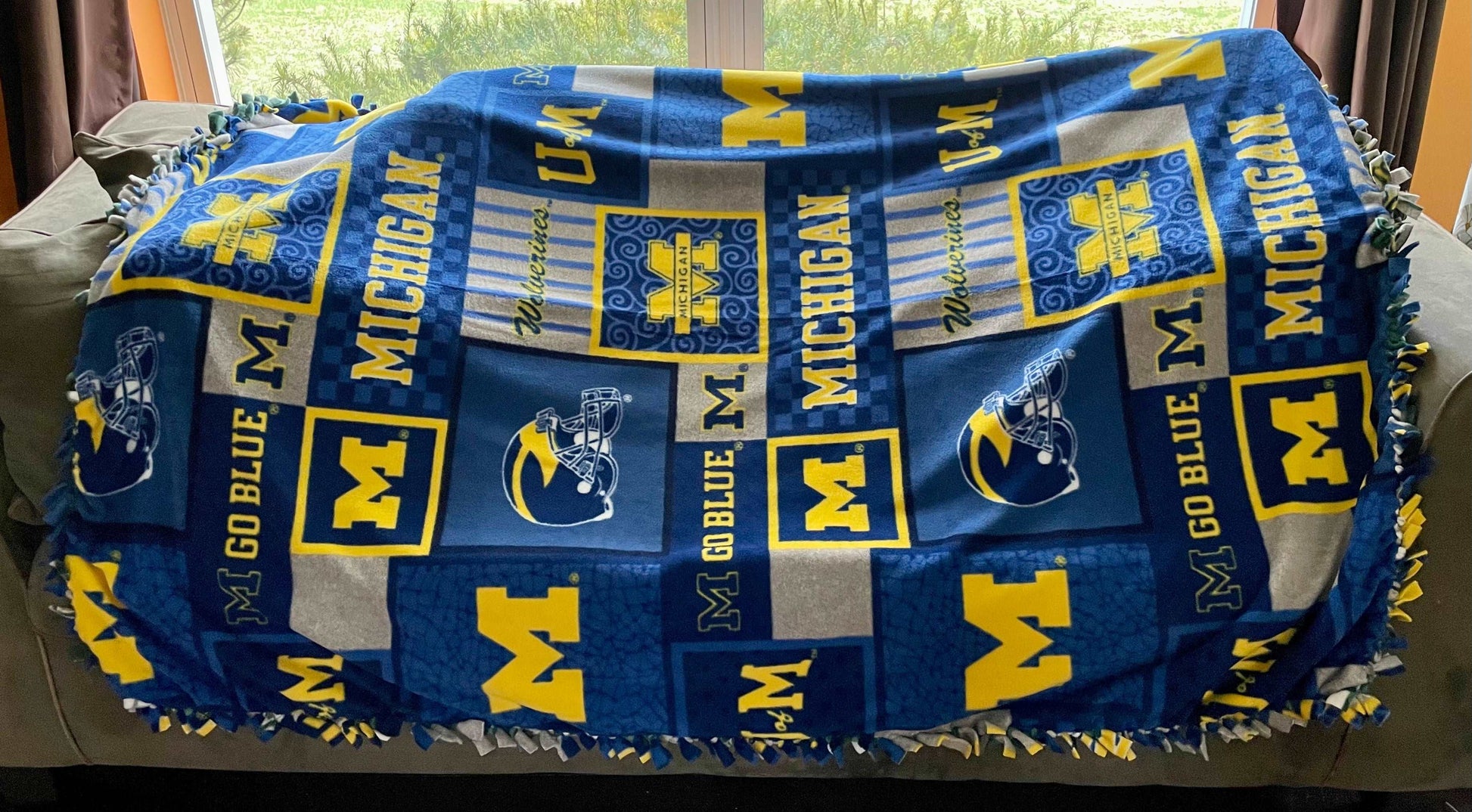 Cuddle up and stay warm with one of my medium size fleece tie knot blankets