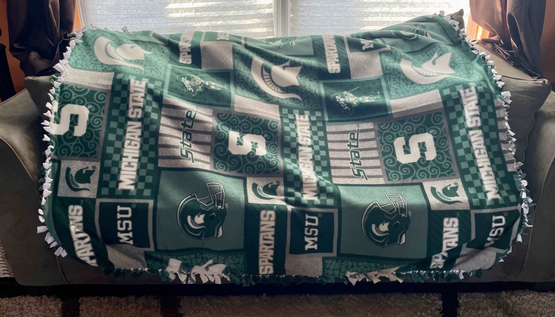 Cuddle up and stay warm with one of my medium size fleece tie knot blankets