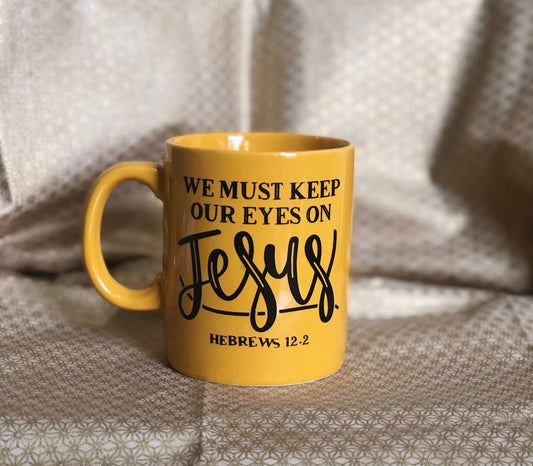 We must keep our eye on.....Enjoy your coffee in this 14 ounce ceramic coffee cup!