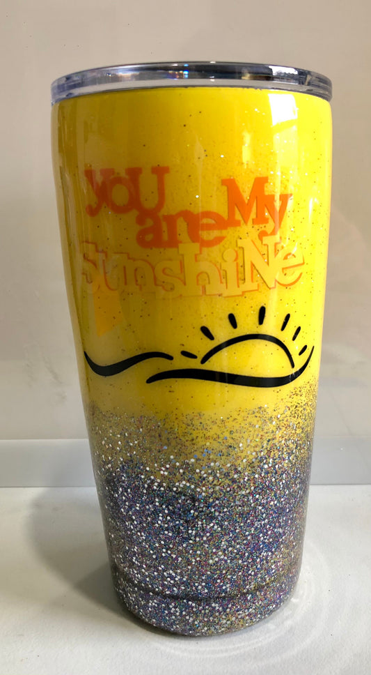 You are my sunshine!. Enjoy a beverage in this 20oz Tumbler.