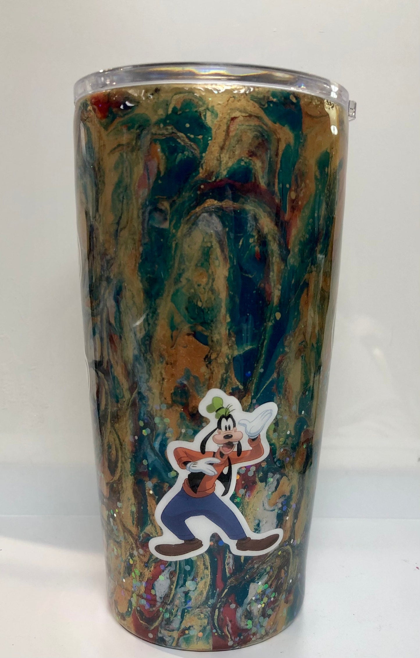 Love Mickey Mouse and Goofy? Enjoy a beverage in this 20oz Tumbler.