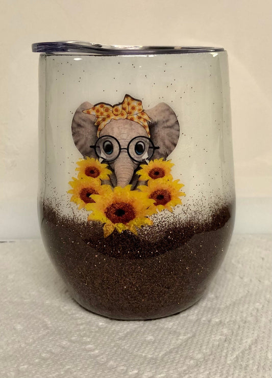 Love Elephants! Enjoy a beverage in this 12oz Tumbler.