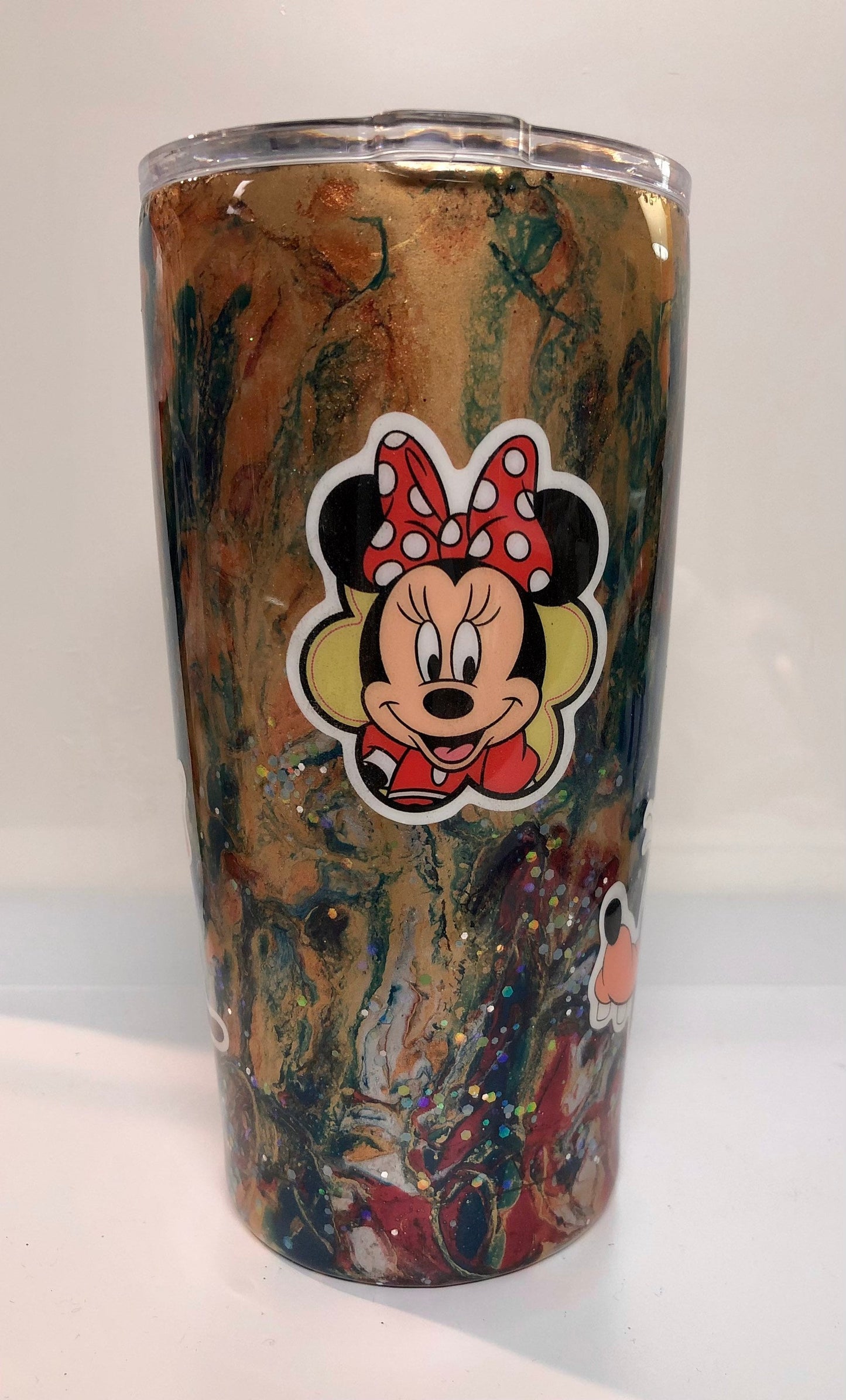 Love Mickey Mouse and Goofy? Enjoy a beverage in this 20oz Tumbler.