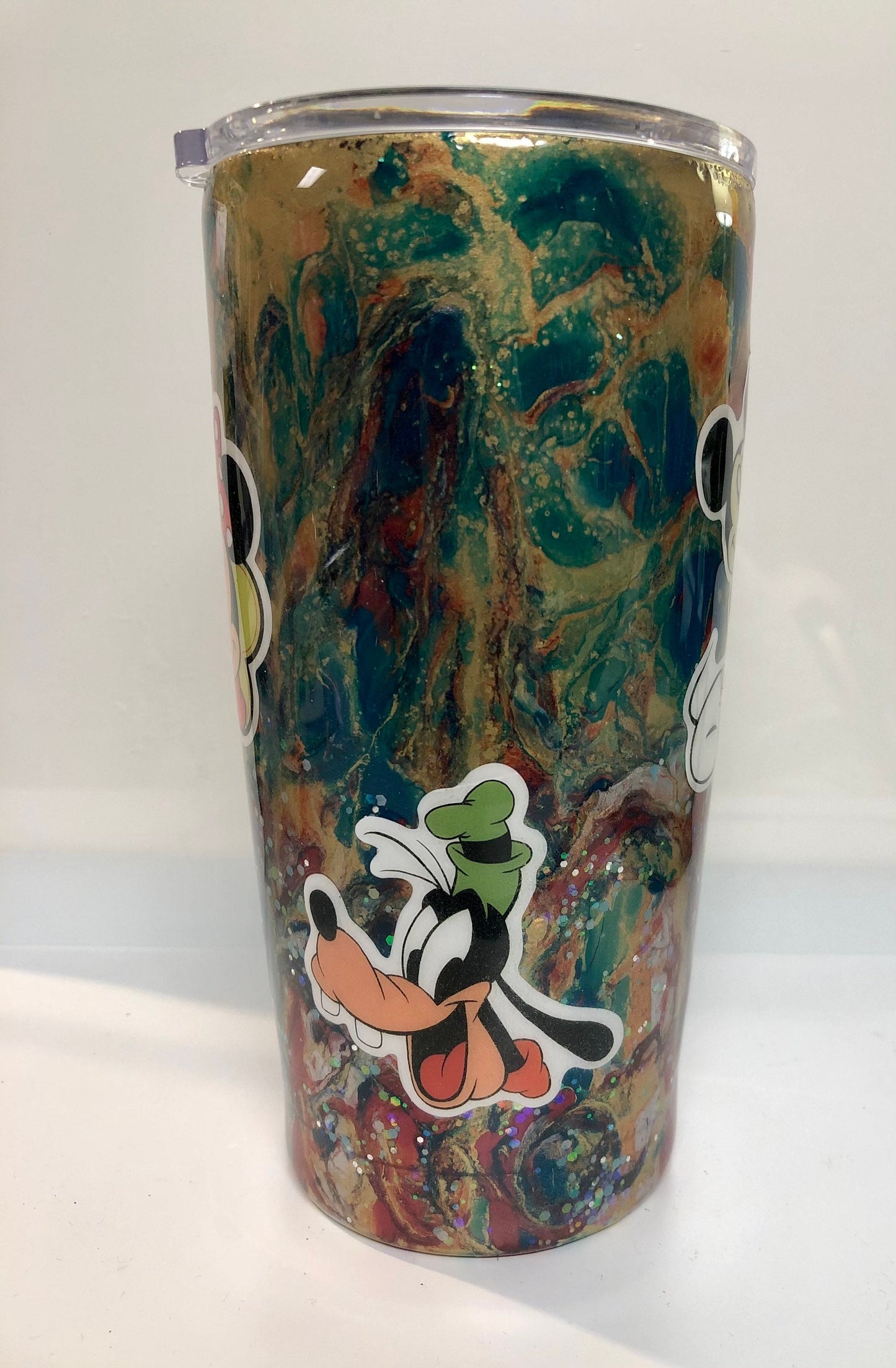 Love Mickey Mouse and Goofy? Enjoy a beverage in this 20oz Tumbler.