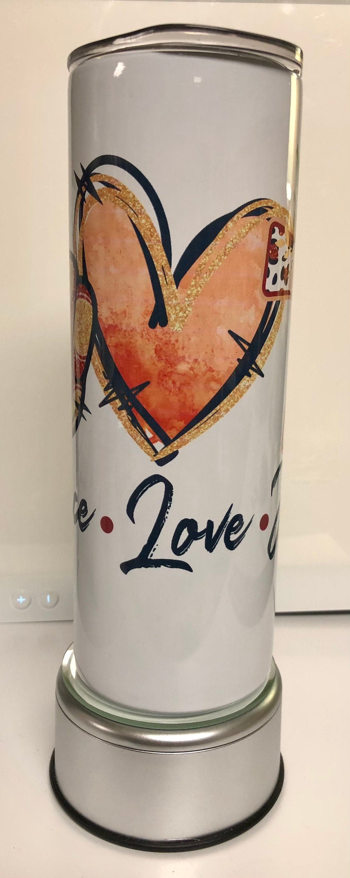 Enjoy a beverage in this 20oz  skinny Tumbler.