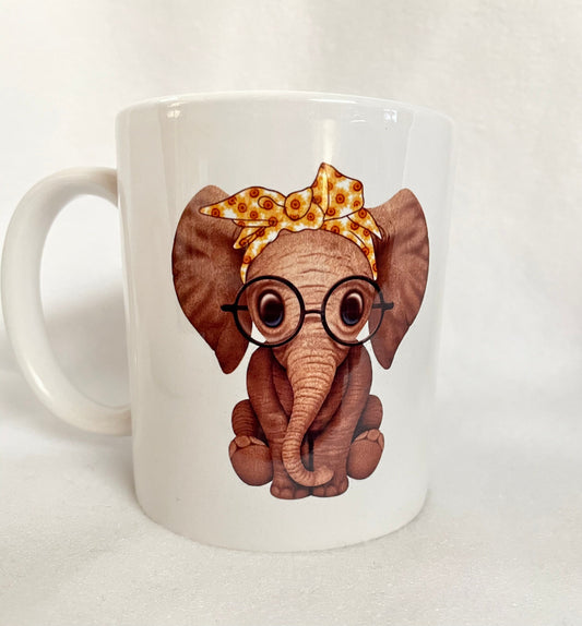 Love Elephants? Enjoy your coffee in this 14 ounce ceramic coffee cup!